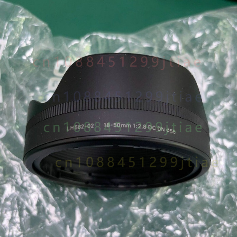 غطاء عدسة الكاميرا الأصلي 55 م - مراجعة Lens Hood Petal وسعره